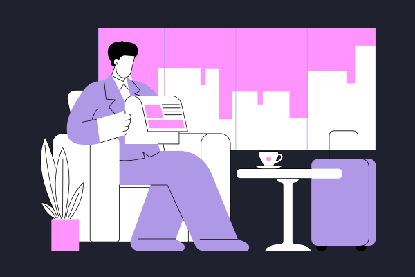 a man sat reading a newspaper in an office